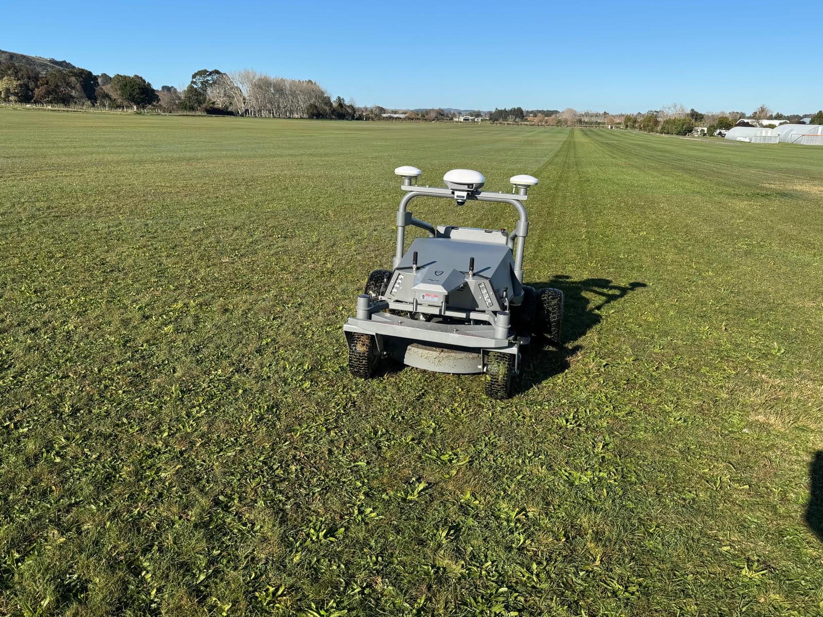 FJD Rough Ranger robotic mower on the runway at Drury Gliding Club